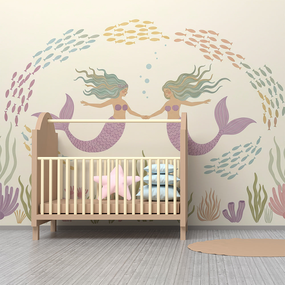 Kids-Mundo mermaid wall mural filling a playroom wall with two lilac-tailed mermaids