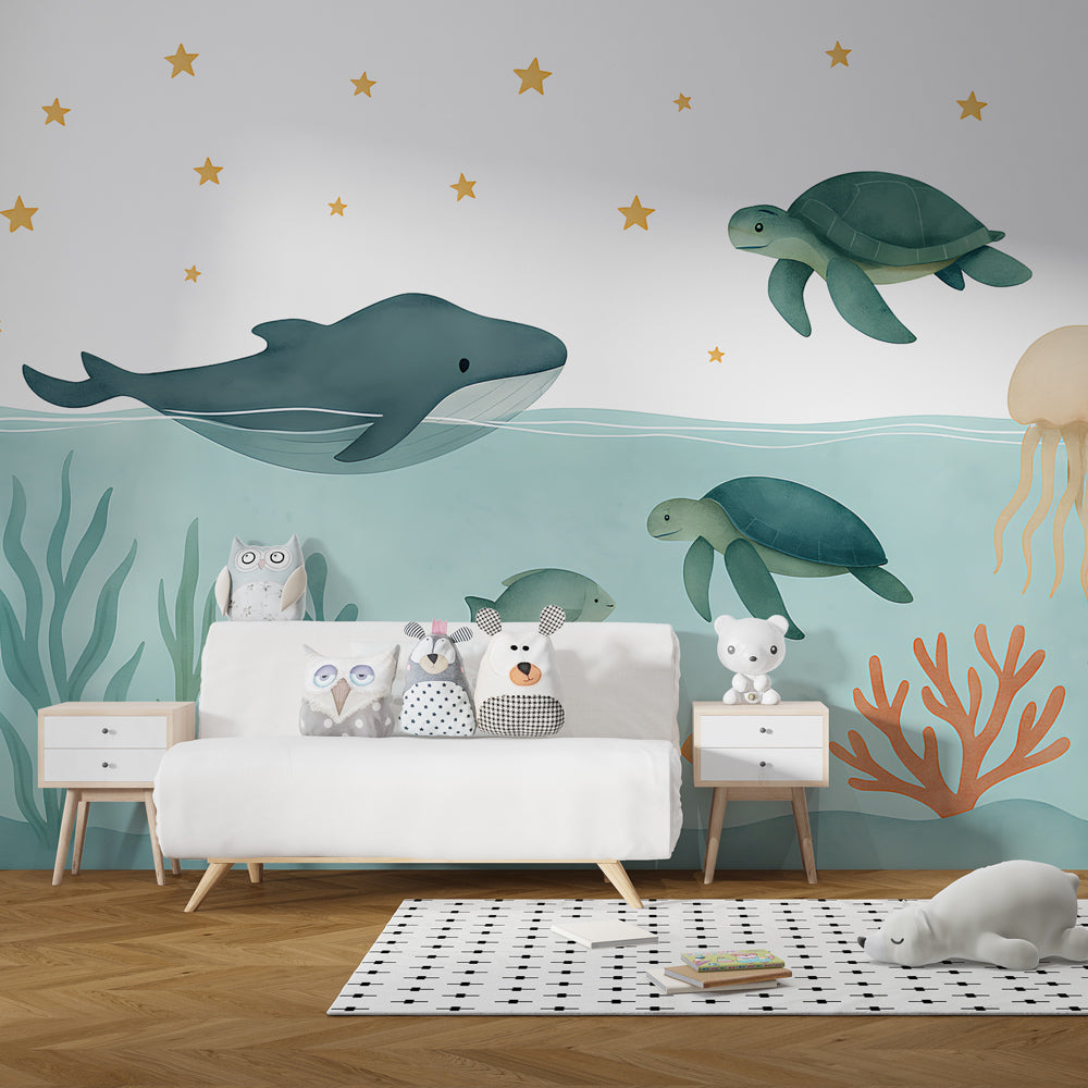 Ocean themed mural wallpaper creating calming underwater atmosphere in children's bedroom