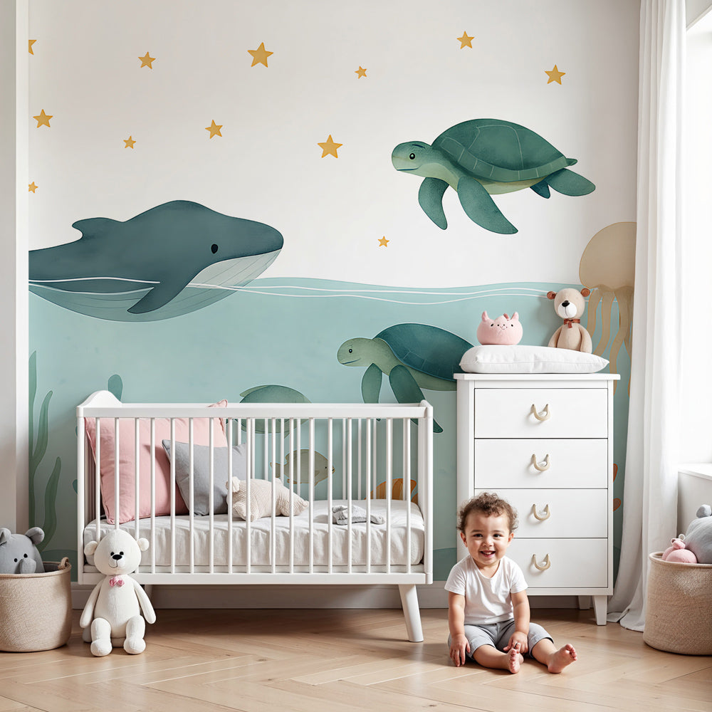 Underwater adventure mural wallpaper with whale and sea creatures in modern kids nursery by Kids-Mundo