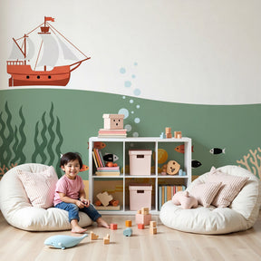 Underwater adventure mural wallpaper with pirate treasure theme in modern kids bedroom by Kids-Mundo