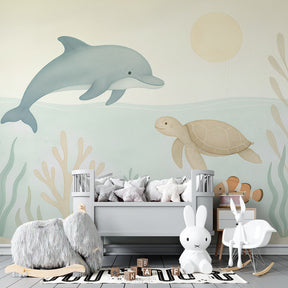 Marine life mural wallpaper with dolphins and coral in children's playroom setting
