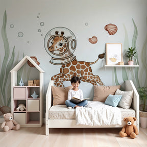 Underwater astronaut giraffe mural wallpaper in modern nursery with ocean-themed decor by Kids-Mundo