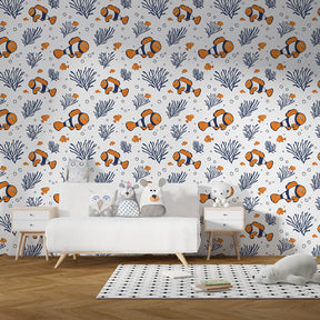 Marine life mural wallpaper featuring clownfish and coral reef in kids playroom decor