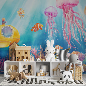 Marine life mural wallpaper with colorful coral reef creating magical underwater playroom atmosphere