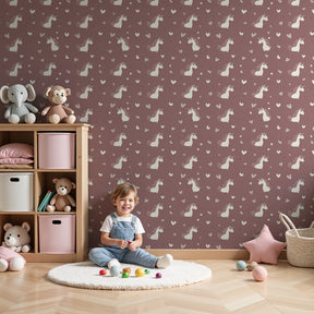 Pink unicorn mural wallpaper with hearts decorating a charming girls bedroom by Kids-Mundo