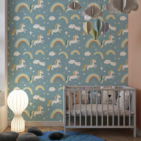 Magical unicorn and rainbow mural wallpaper creating enchanted nursery decor atmosphere
