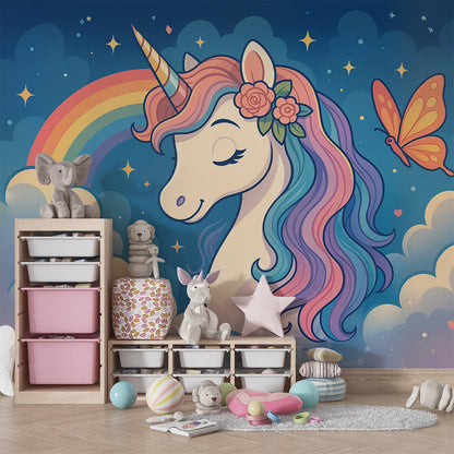 Kids-Mundo unicorn wall mural with rainbow and clouds behind a bed in a cosy kids bedroom