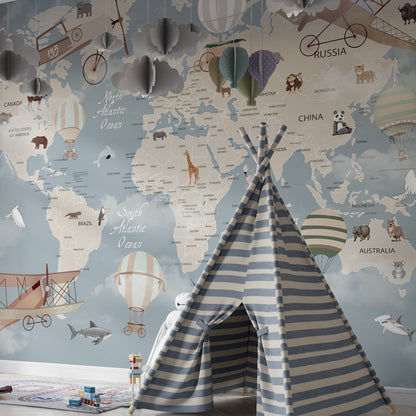 Kids-Mundo animal-themed world map mural in a playroom, striped balloons drifting above labelled oceans.