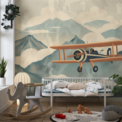 Kids-Mundo vintage biplane mountain wall mural brightening a colourful children's playroom corner