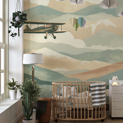 Kids-Mundo biplane and mountain wall mural brightening a playful children's playroom space