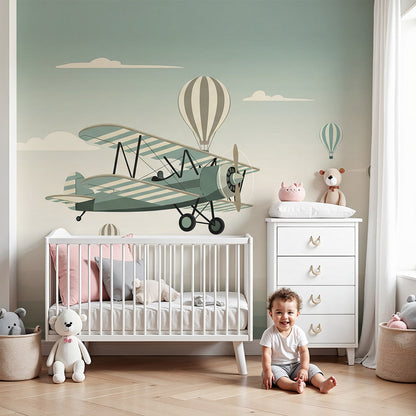 Kids-Mundo vintage biplane wall mural with hot air balloons in a soft nursery scene