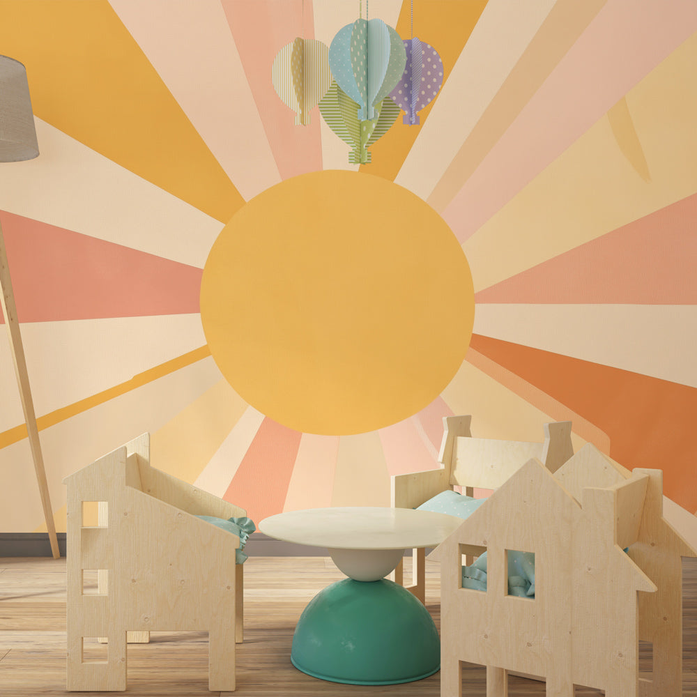 Kids bedroom featuring vintage sun wallpaper with warm multicolored retro design