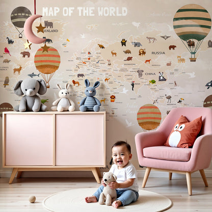 Kids-Mundo warm-tone world map wall mural in a nursery, colourful balloons and animals above the cot.