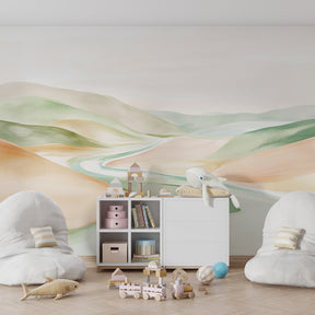 Gentle watercolor valley mural wallpaper transforming children's playroom into nature sanctuary