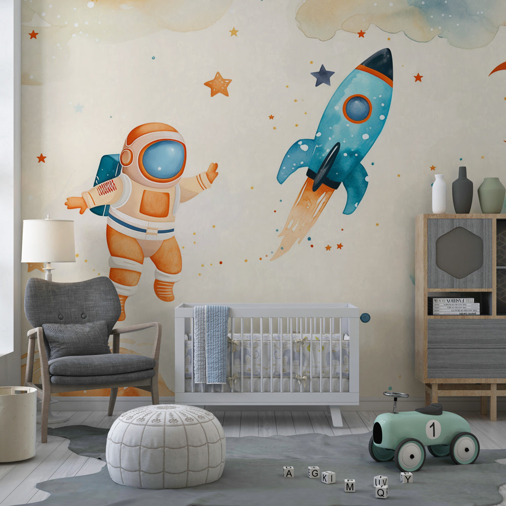 Kids-Mundo soft watercolour space mural on a feature wall in a toddler's bedroom.