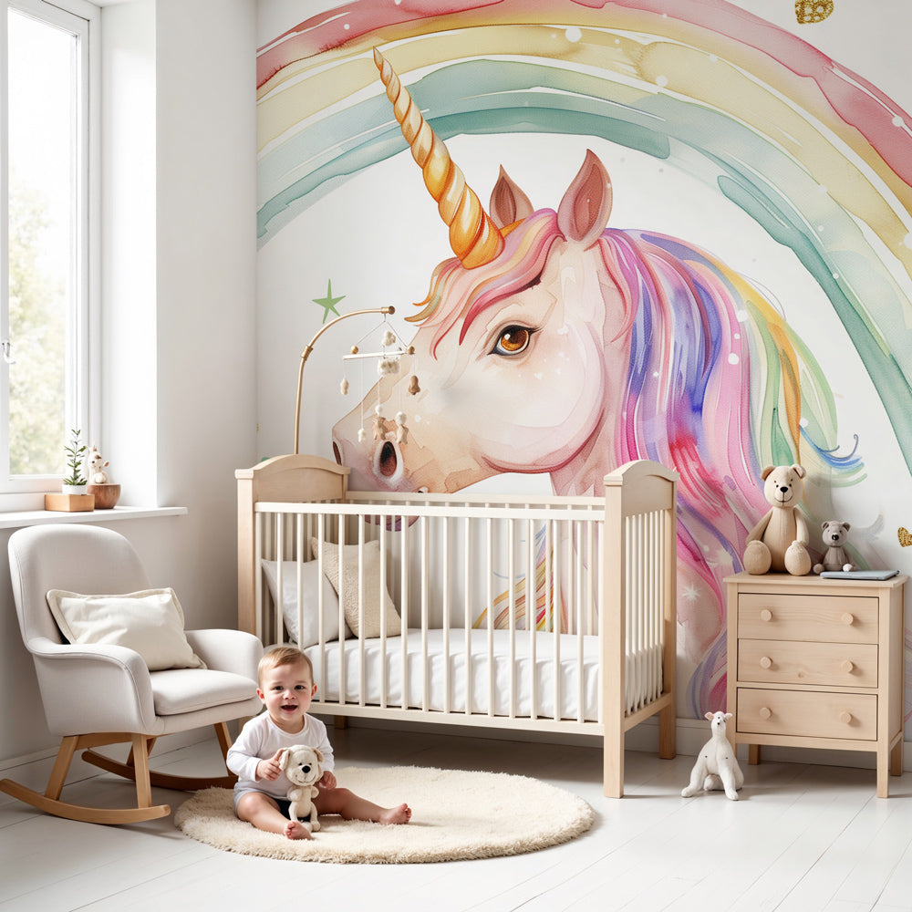Kids-Mundo watercolour unicorn rainbow wall mural above a white cot in a soft pastel nursery