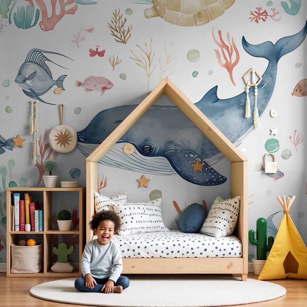 Kids-Mundo watercolour whale ocean wall mural styled in a soft white nursery