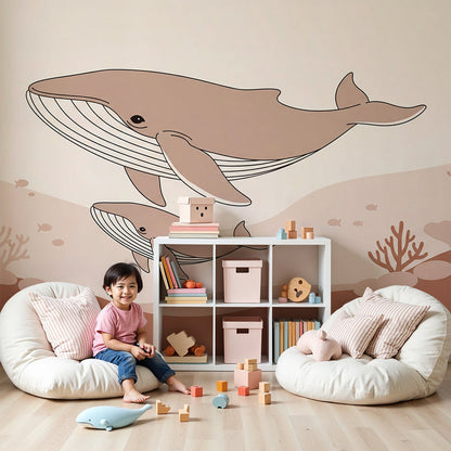 Kids-Mundo whale and calf wall mural styled above a cot in a soothing, ocean-themed nursery.