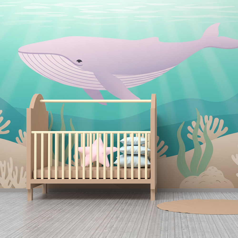 Marine whale wallpaper complementing natural wood furniture in peaceful kids room by Kids-Mundo