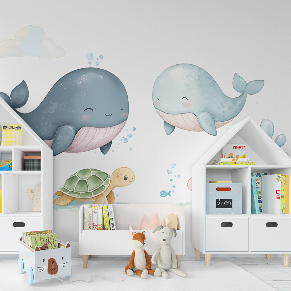 Kids-Mundo watercolour whales and turtle mural covering a feature wall in a bedroom