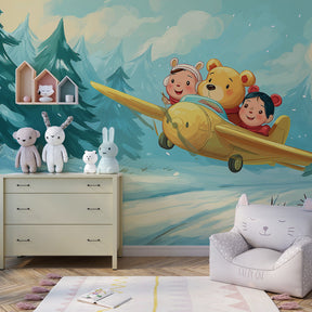 Winter themed airplane mural wallpaper creating magical playroom atmosphere for children