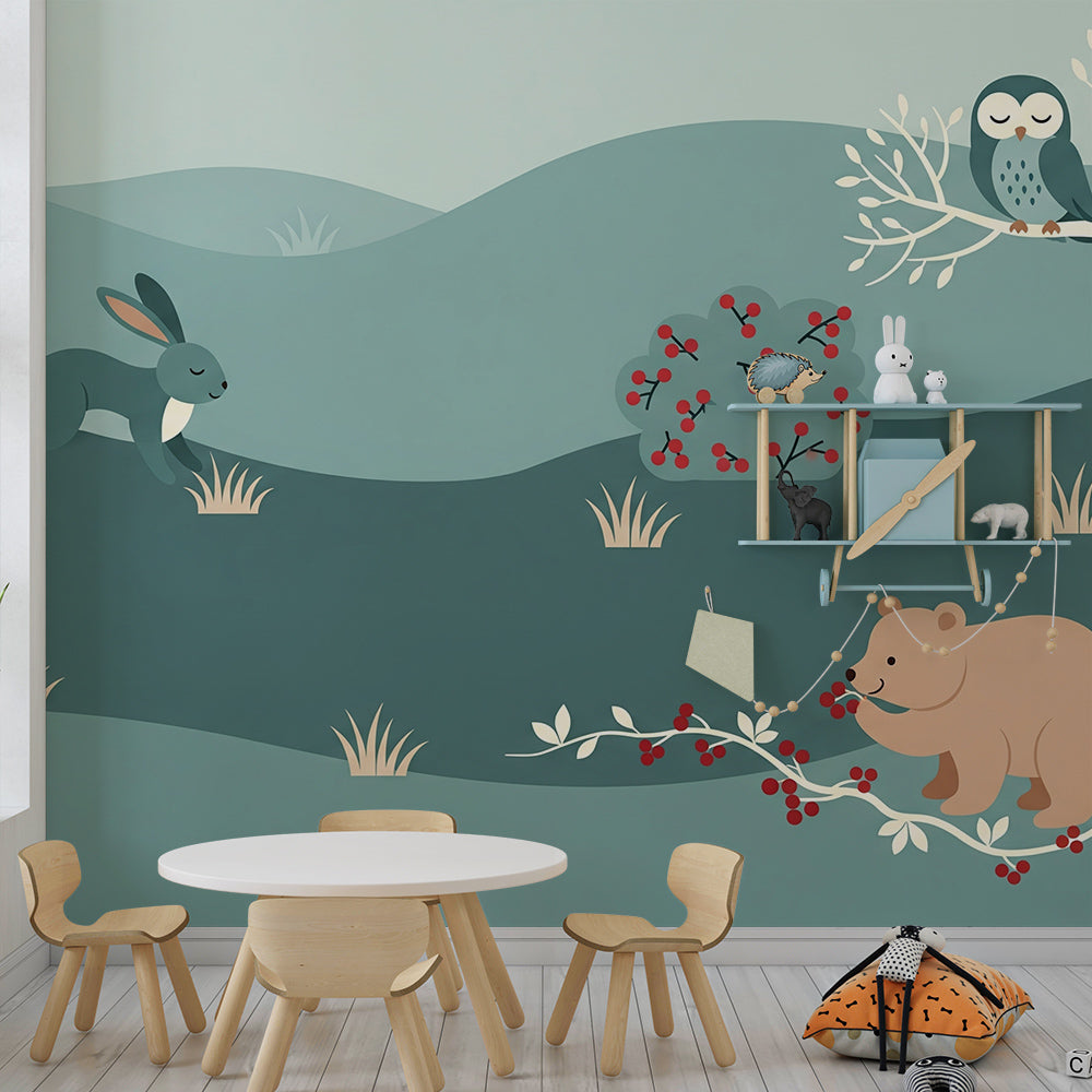 Kids-Mundo winter forest mural with fox, bear and owl styled in a playroom