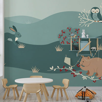 Kids-Mundo winter forest mural with fox, bear and owl styled in a playroom