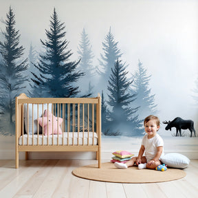 Winter forest mural wallpaper with majestic elk in snowy nursery room by Kids-Mundo