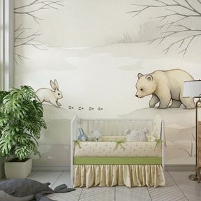 Winter forest mural wallpaper with rabbit and bear in neutral nursery reading corner