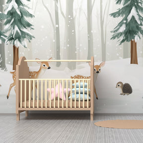 Snow-covered forest wallpaper with woodland animals in cozy kids playroom setting