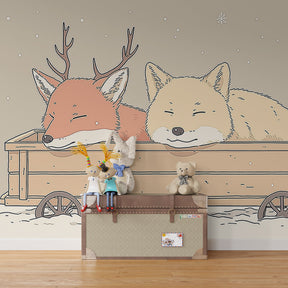 Peaceful winter animal mural wallpaper with sleeping fox and fawn in children's bedroom