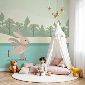 Winter rabbit ice skating mural wallpaper in cozy children's nursery room by Kids-Mundo