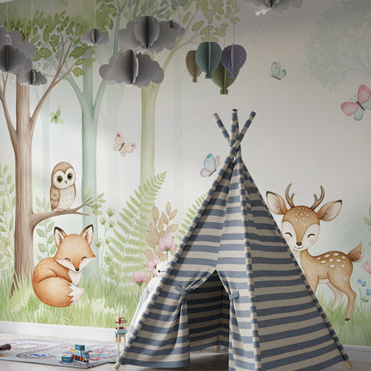 Kids-Mundo woodland animals wall mural with owls and butterflies in a green playroom corner