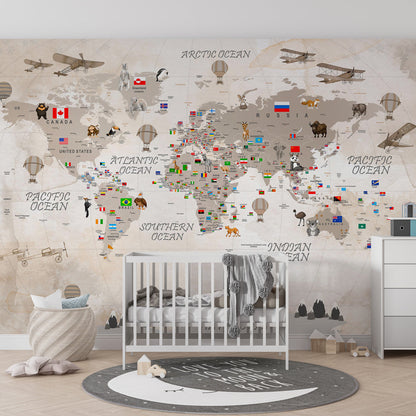 Kids-Mundo world map wall mural with hot air balloons and animals displayed in a bright playroom
