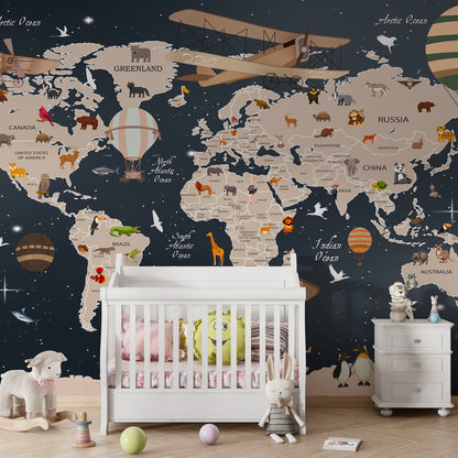 Kids-Mundo starlit world map wall mural behind a bed in a navy kids bedroom