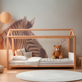 Safari zebra wallpaper in modern baby bedroom with natural wood furniture by Kids-Mundo