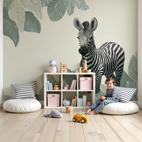 Zebra safari mural wallpaper creating adventurous nursery decor with green foliage by Kids-Mundo